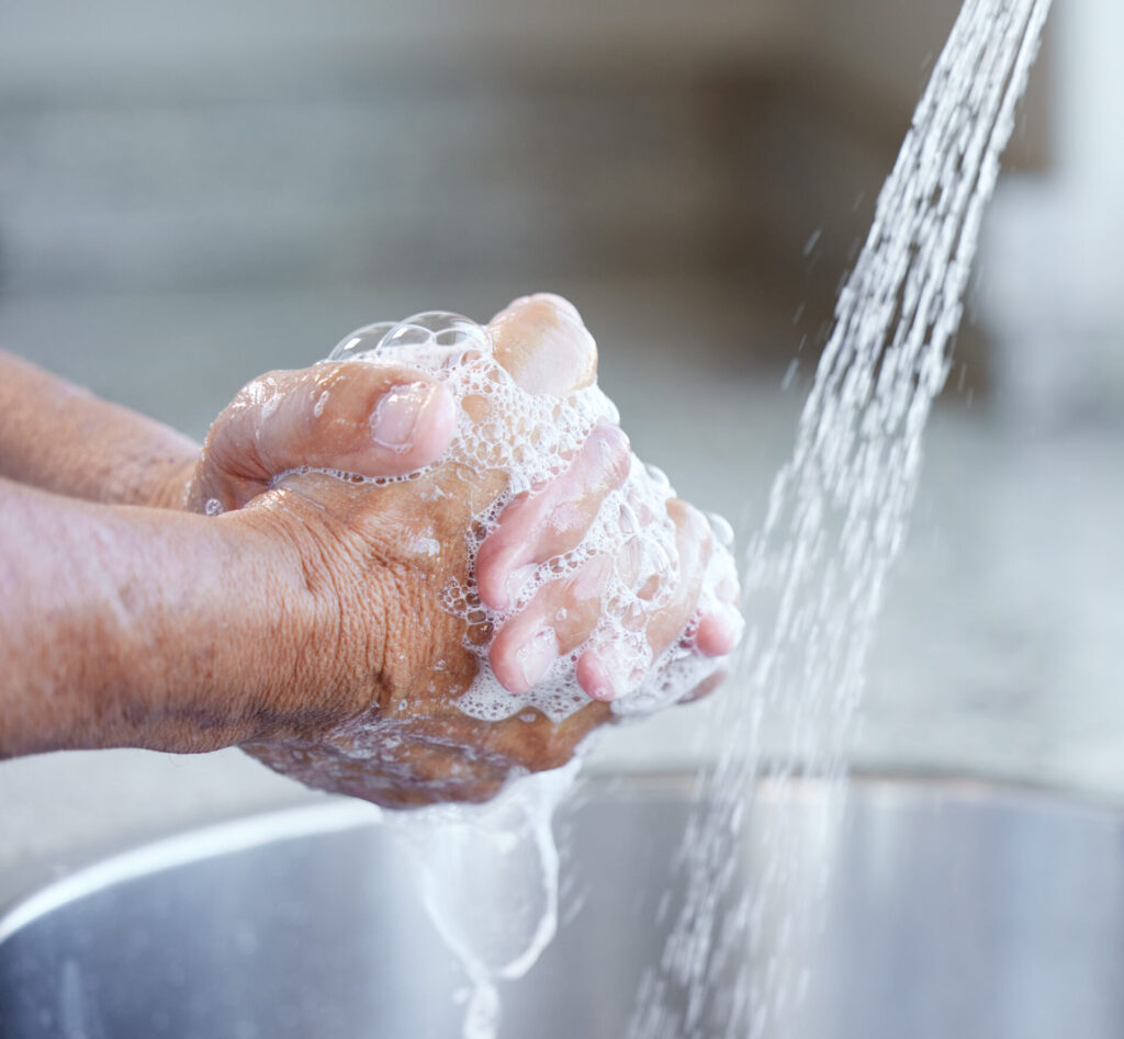 hands-washing-and-soap-with-water-at-sink-for-hea-2023-11-27-04-50-04-utc